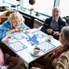 Seniors playing Keeping Busy bingo puzzles