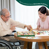 senior doing broadcasting jigsaw puzzle with dementia nurse