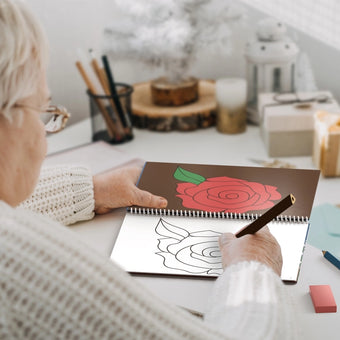 senior with Alzheimer's coloring rose