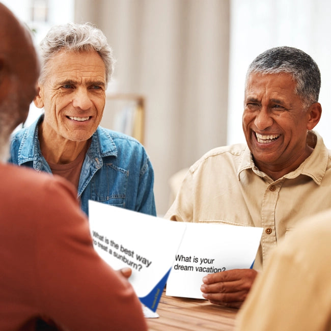 happy men using conversation cards