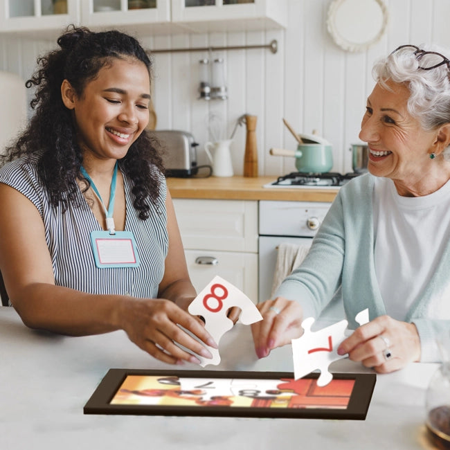 women doing numbered jigsaw puzzle for dementia patients