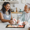 women doing numbered jigsaw puzzle for dementia patients