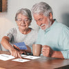 Seniors Playing Expressions Card Game for Dementia Patients