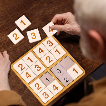 Senior playing Easy Sudoku Game for Dementia Patients