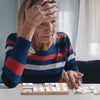 Elderly Senior Playing Easy Sudoku Game for Dementia Patients