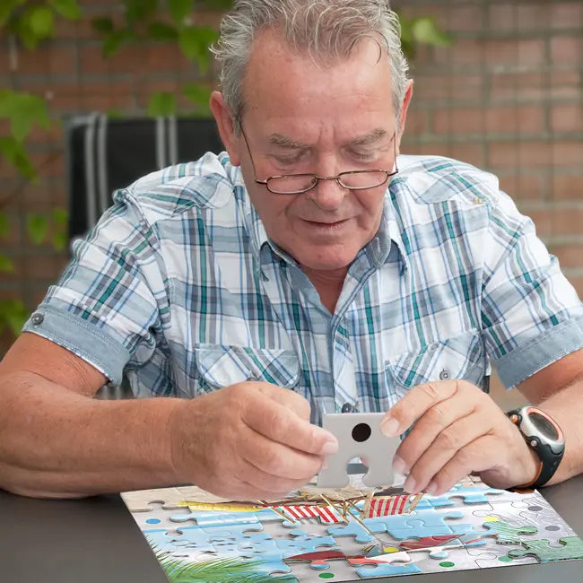 Senior doing Beachfront Jigsaw Puzzle for Dementia Patients