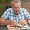 Senior doing Broadcasting Jigsaw Puzzle for Dementia Patients