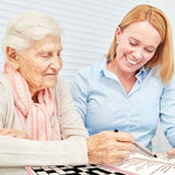 Senior doing Simple Crossword Puzzle for Dementia Patients
