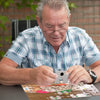 Senior Male doing Busy Kittens in a Basket 35 Piece Sequenced Jigsaw Puzzle for Elderly Adults with Dementia & Alzheimer's