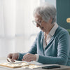Elderly Senior playing Easy Sudoku Game for Alzheimer's Patients